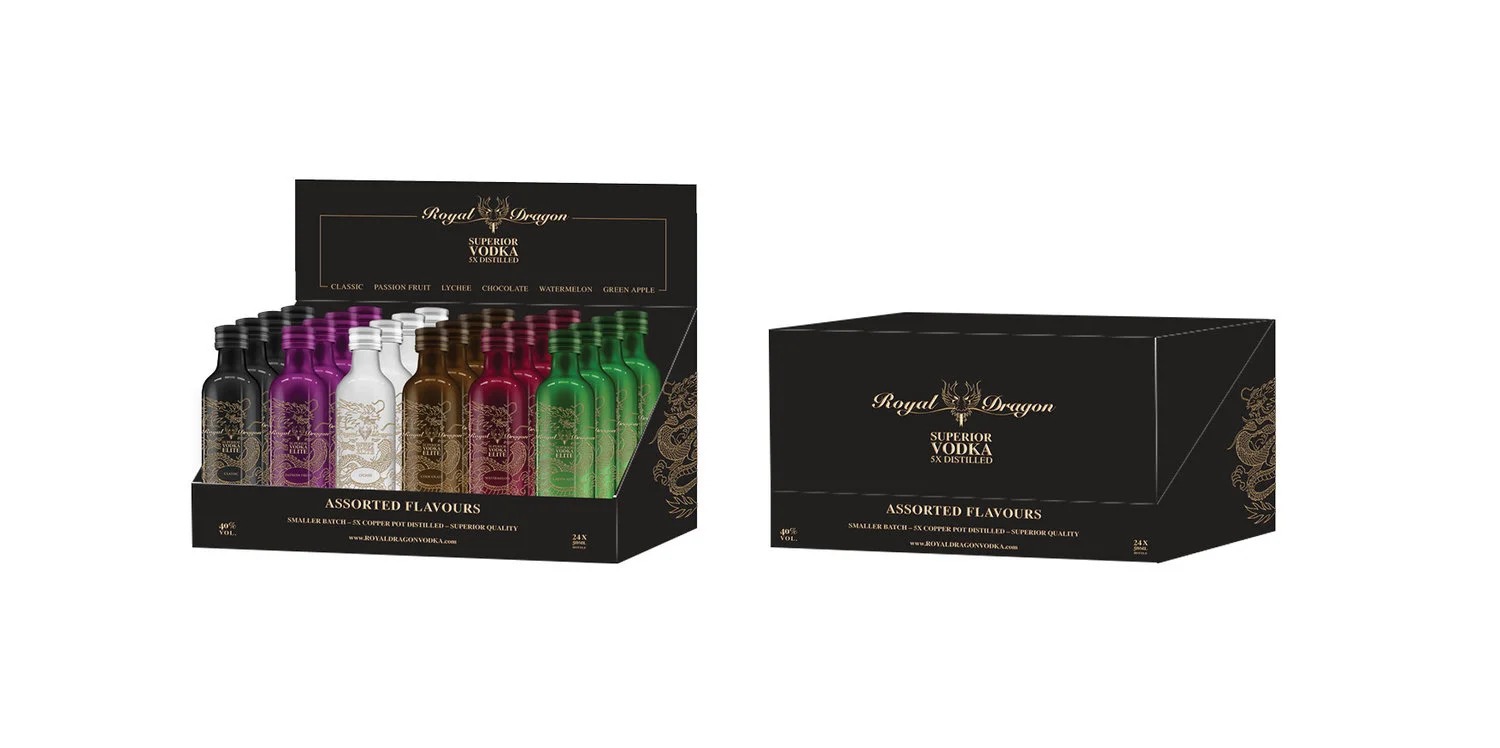 The 24 x 50ml case ships closed and opens into a counter display, the lid becoming the header card. Nothing to unpack or arrange, which is what gets it onto a duty free counter at all